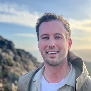 Bill Meincke standing on a mountain