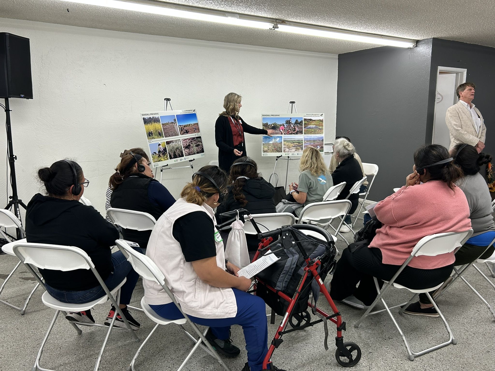 A photograph of people in a breakout session.